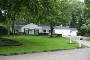 White house in a rural neighborhood